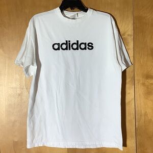 Adidas white tee with black raised lettering, size medium